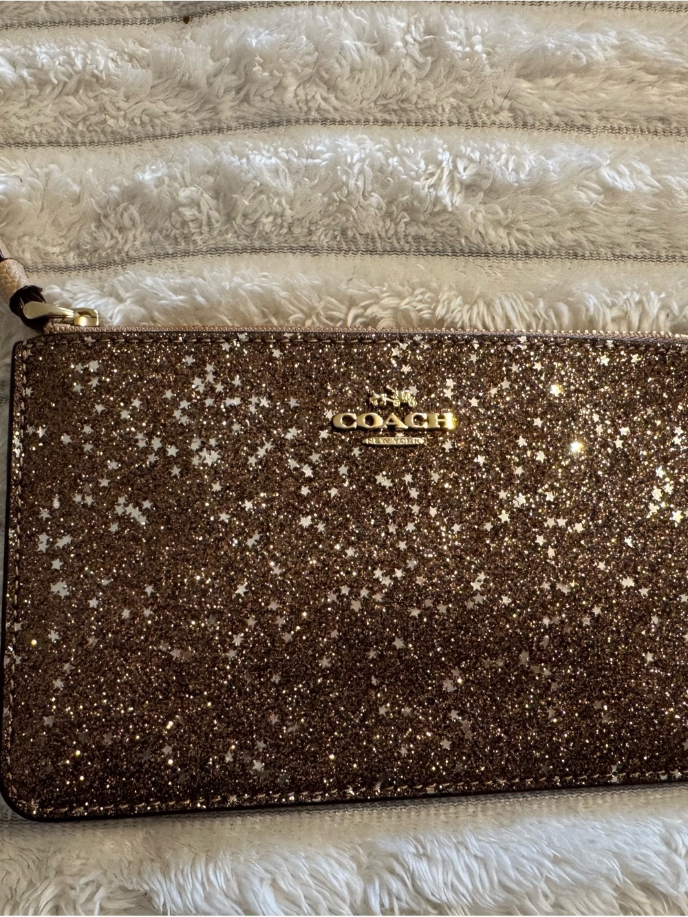 COACH Rose Gold Glitter Star Wristlet